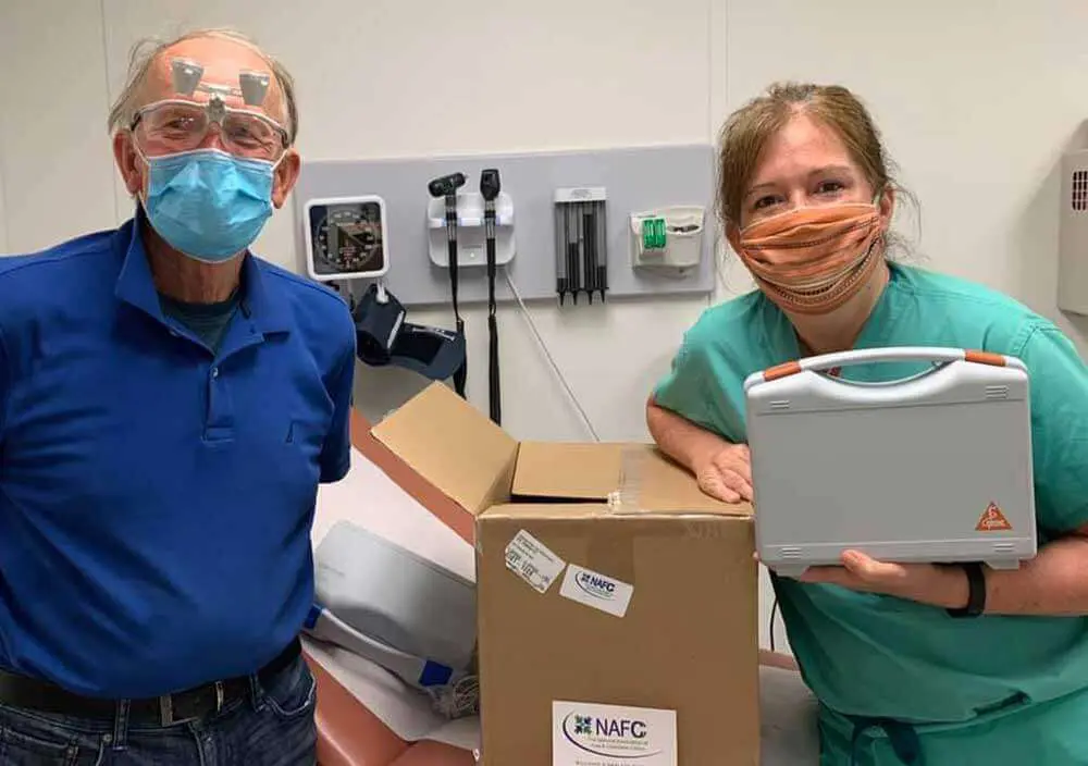 51252081129_f6f195ab53_o workers smiling with masks